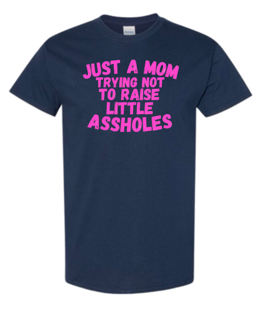 Just a Mom trying not to raise little Assholes Heavy Cotton T-shirt